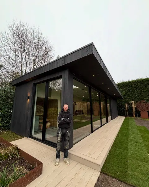 Here is the “garden room” a sauna, gym and golf simulator. All timber frame fini