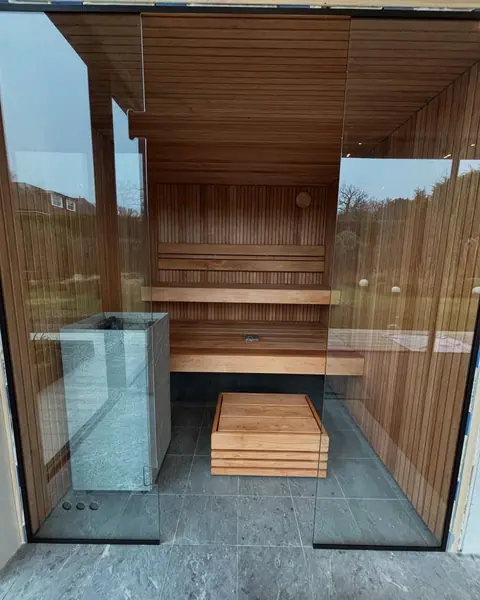 Here is the “garden room” a sauna, gym and golf simulator. All timber frame fini