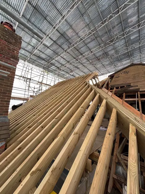 The latest little mission. Not the roof just the 8”x3”s @ 300 centers! Me and Na