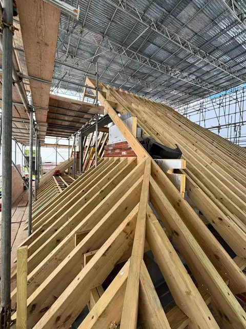 The latest little mission. Not the roof just the 8”x3”s @ 300 centers! Me and Na