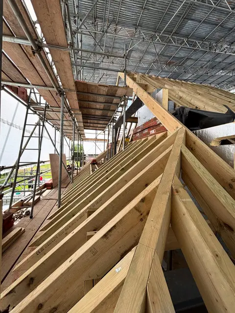 The latest little mission. Not the roof just the 8”x3”s @ 300 centers! Me and Na