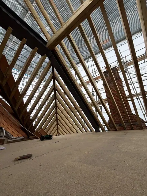 The latest little mission. Not the roof just the 8”x3”s @ 300 centers! Me and Na